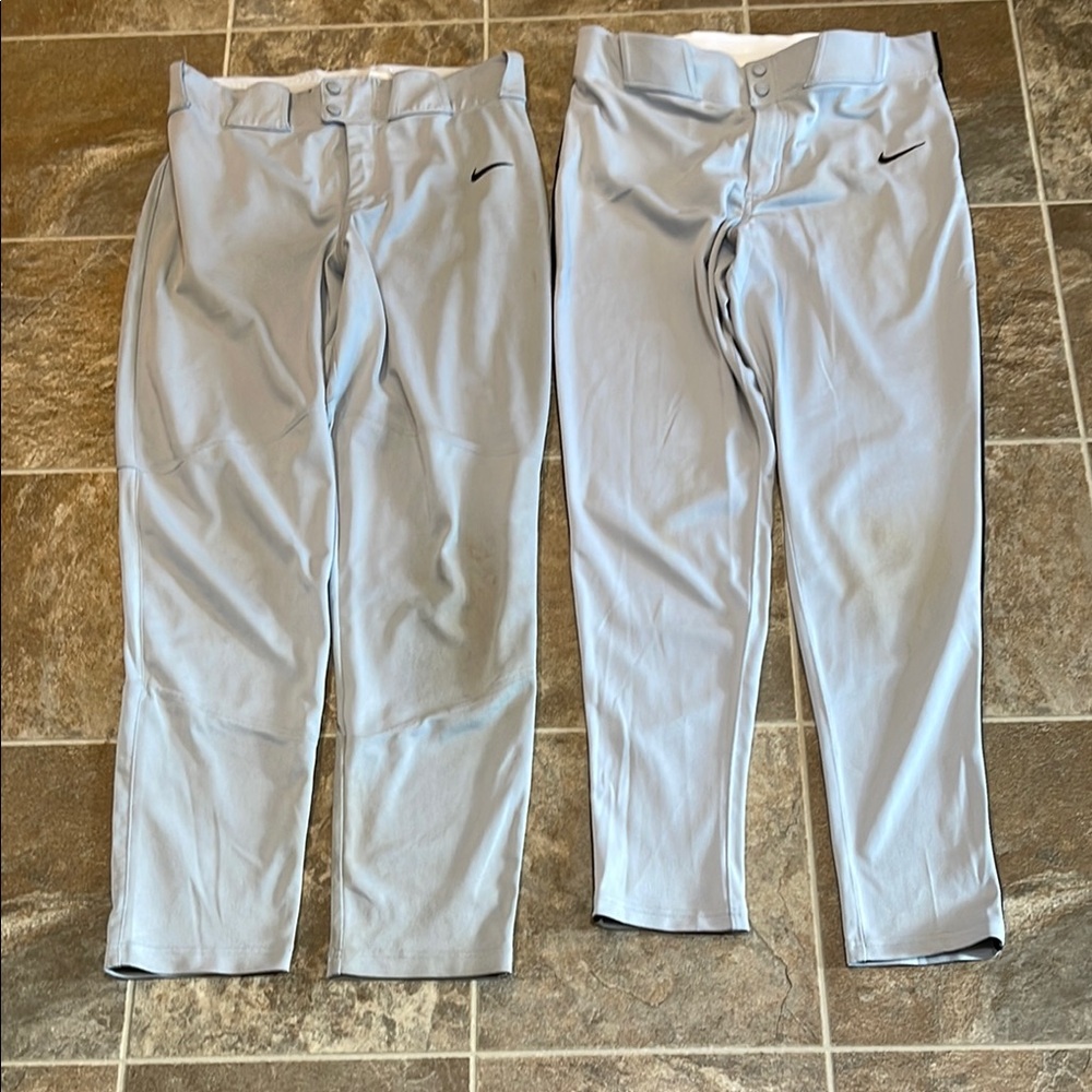 2 Nike baseball pants hole